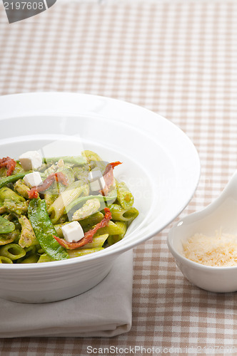 Image of Italian penne pasta with sundried tomato and basil