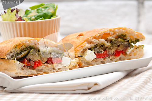 Image of ciabatta panini sandwichwith vegetable and feta