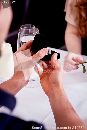 Image of happy couple in restaurant romantic date 