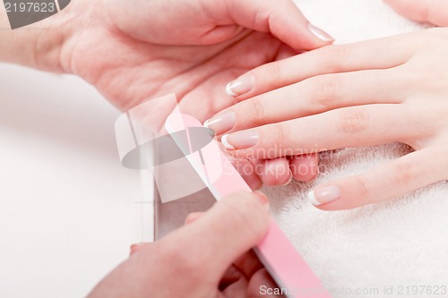 Image of manicure making in beauty spa salon 