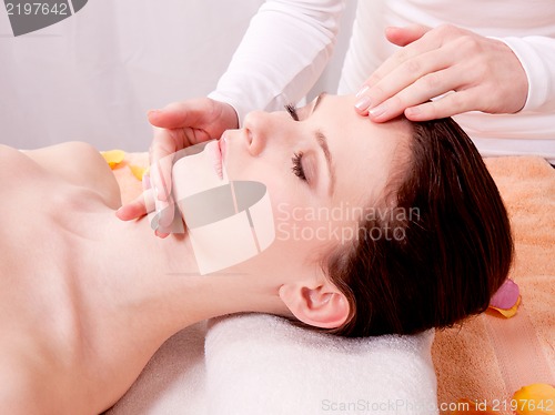 Image of young attractive smilig woman doing wellness spa
