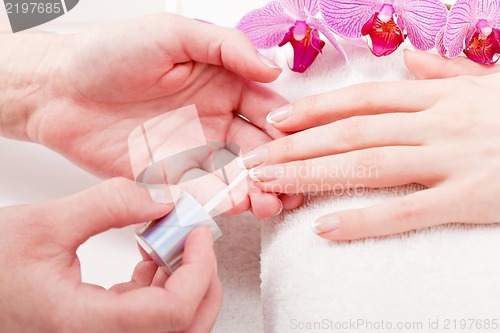 Image of manicure making in beauty spa salon 