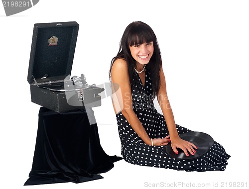 Image of Pretty woman with gramophone