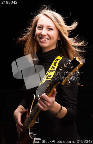 Image of Woman with guitar