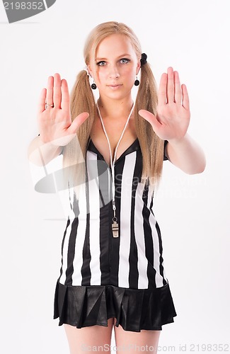 Image of Football referee showing stop gesture