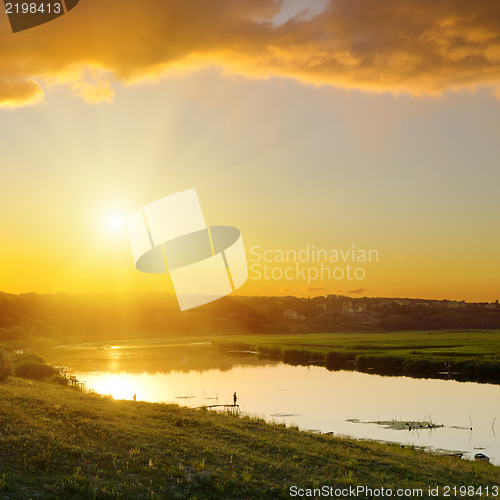 Image of dramatic sunset over river 