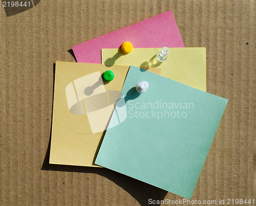 Image of color notepaper and clips