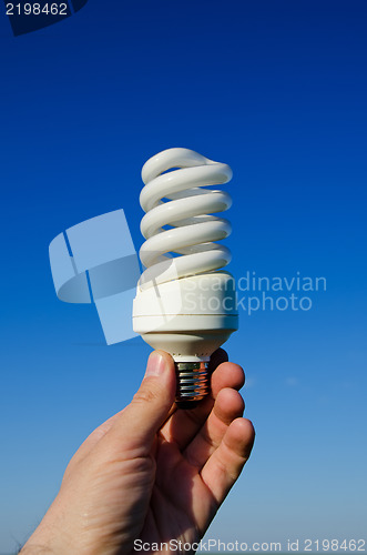 Image of light bulb in hand