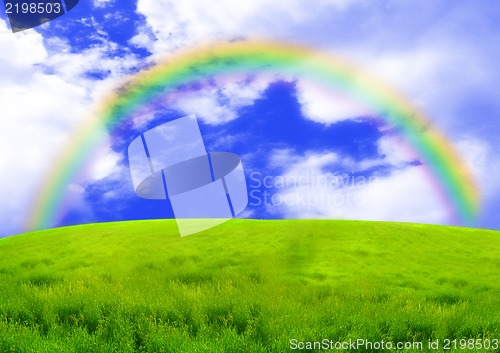 Image of Rainbow over a green glade