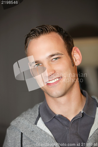 Image of Blue eyed handsome confident young man