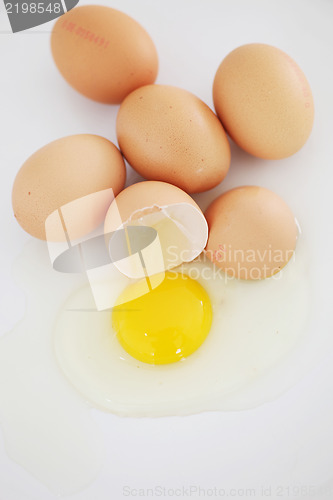 Image of One cracked egg in a group