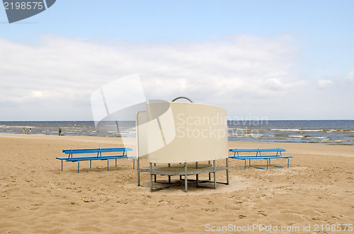 Image of blue wooden bench change cabin sea beach people 