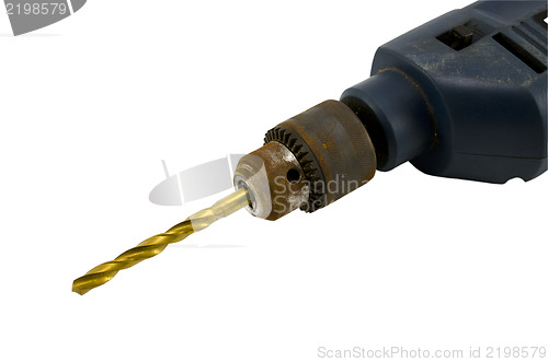Image of rusty retro electric drill golden bit closeup 