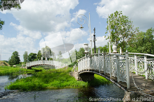 Image of retro white decorative bridges park stream river 