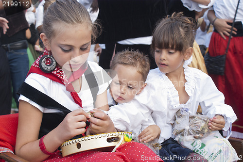 Image of sicilian children in traditional dress