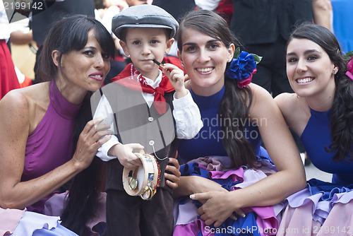 Image of Beautiful woman of Spain folk group and sicilian child