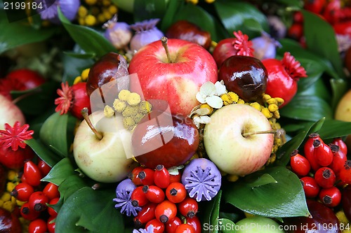 Image of Fall arrangement with fruits and flowers