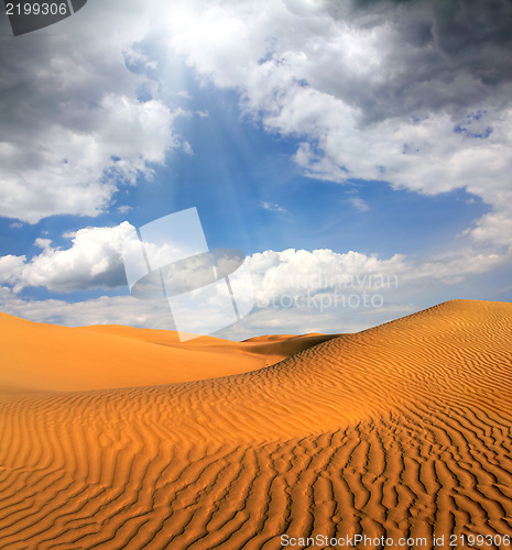 Image of cloudy evening desert landscape