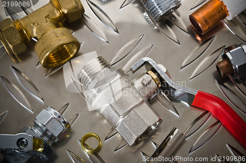 Image of Plumbing Kit on a metal surface