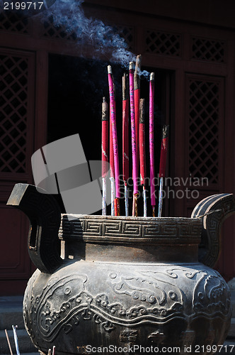 Image of Burning incense sticks