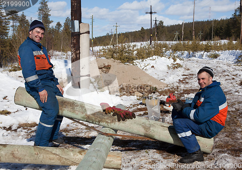 Image of Young workers electricians. Outage