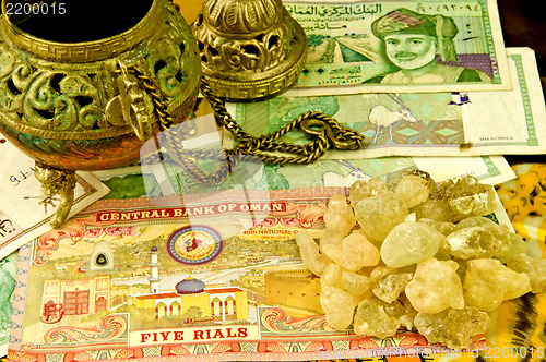 Image of Olibanum with banknotes of Oman