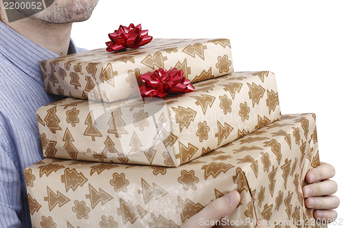 Image of Young man holding a present