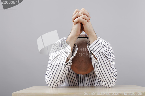 Image of Man at desk