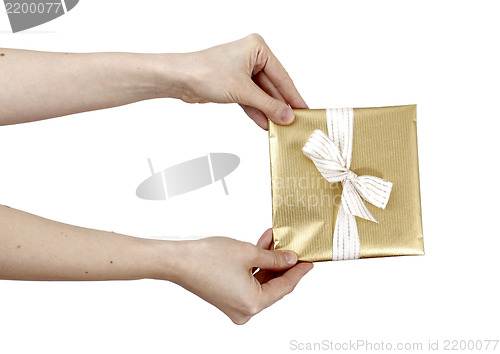 Image of Young woman holding a present