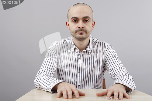 Image of Man at desk