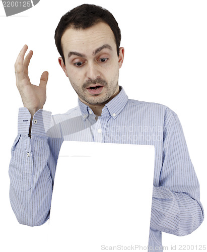 Image of Man holding a paper