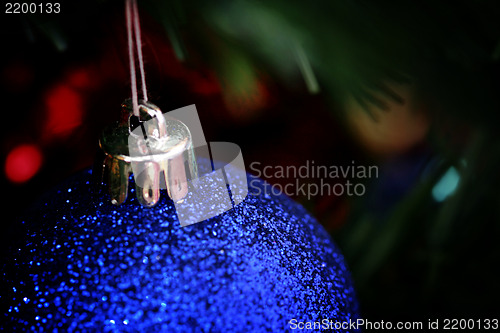 Image of Christmas ornaments on tree.