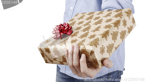 Image of Young man holding a present