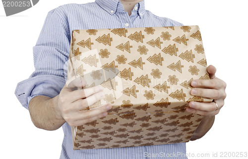 Image of Young man holding a present