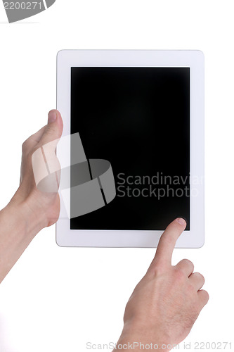 Image of Hands Holding and Using a Tablet Touch Computer Gadget