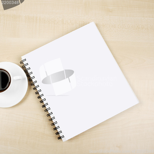 Image of White cup and white page