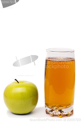 Image of glass of apple juice and green apples isolated on white