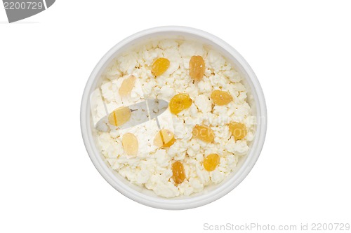 Image of cheese in plastic container with raisins