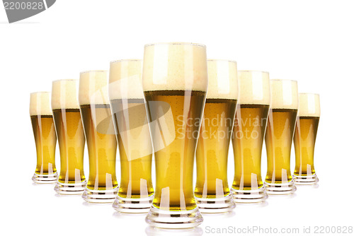 Image of Frosty glass of beer with foam isolated on a white background