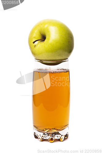 Image of glass of apple juice and apples isolated on white