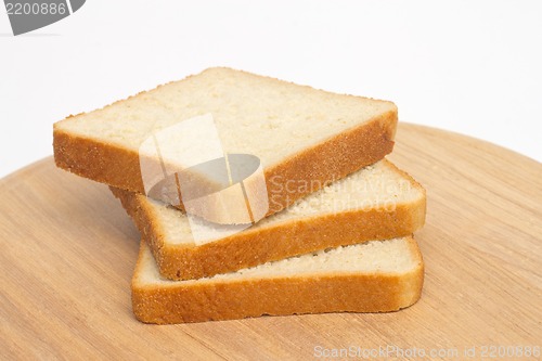 Image of Slices of bread on white background