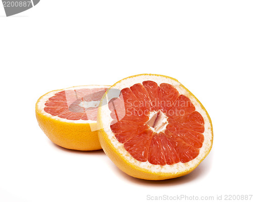 Image of Grapefruit with slices on a white background.