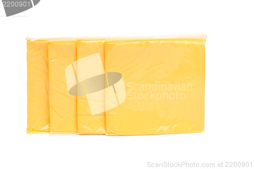 Image of cheese slices on white background.