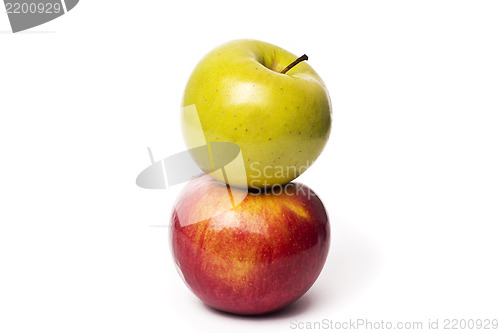 Image of Two apples, Red Delicious and Granny Smith, isolated on white ba