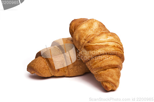 Image of two croissants isolated on white background