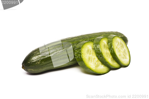 Image of Cucumber and slices isolated over white background.