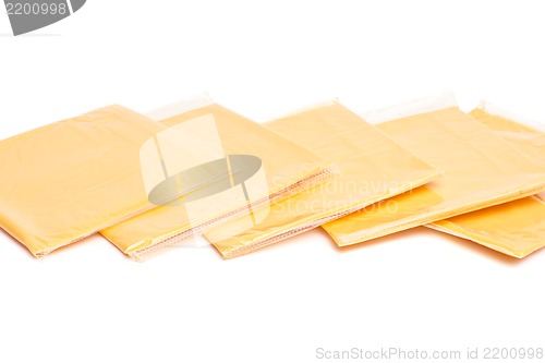Image of cheese slices isolated on white