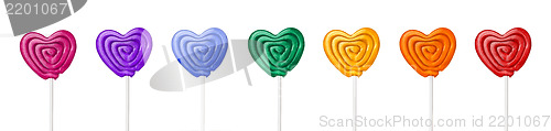 Image of  colorful heart shape lollipop on white background