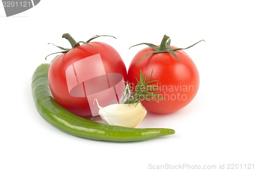 Image of Chili pepper, garlic and tomatos isolated on white background