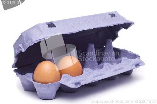 Image of the brown eggs in egg box